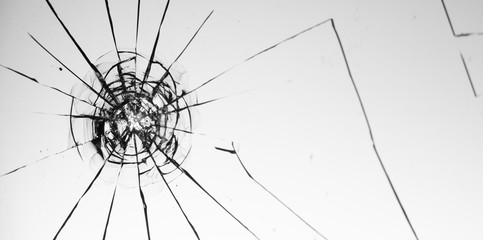 Cracked glass on a white background texture