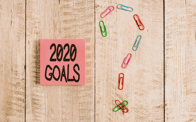 Writing note showing 2020 Goals. Business concept for A plan to do for something new and better for...