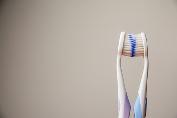 Two toothbrushes in emotional interaction. Relationship concept.