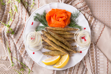 Snack to beer fried crispy small smelt fish. Balkan cuisine. Restaurant menu