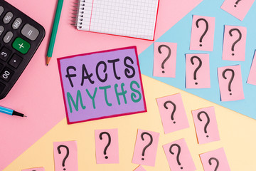Handwriting text Facts Myths. Conceptual photo work based on imagination rather than on real life difference Mathematics stuff and writing equipment above pastel colours background