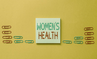 Word writing text Women S Health. Business photo showcasing Women s is physical health consequence avoiding illness Colored blank sticky note clips gathered trendy cool pastel background