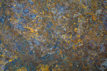 Abstract grunge rustic background. Colorful rusty background. Selective focus