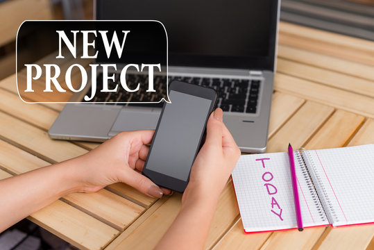 Word writing text New Project. Business photo showcasing individual enterprise that is planned to achieve particular aim woman laptop computer smartphone office supplies technological devices