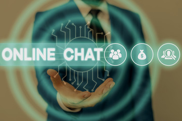 Text sign showing Online Chat. Business photo showcasing talking with friend or someone through internet and PC phone Male human wear formal work suit presenting presentation using smart device