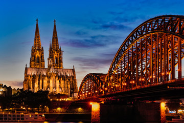Cologne Cathedral and Hohenzollern Bridge at twilight , Cologne, Germany