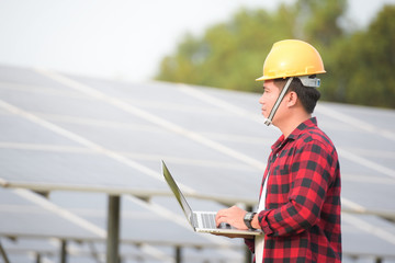 Engineers inspect at solar power stations in Asia