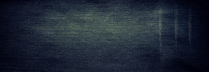 Retro color tone of blue denim jeans fabric texture for background website fashion design or backdrop product.
