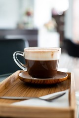 a cup of chocolate milk, a cup of hot chocolate, hot chocolate