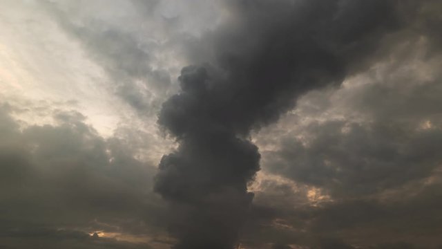Time lapse of sky with storm clouds at sunset
