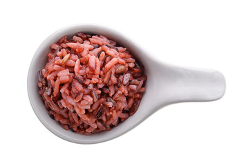 brown rice in white bowl on white background