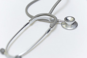 Medical stethoscope isolated on white background.