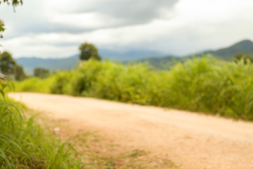 The road on the background is blurred to enter text