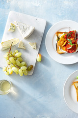 Snacks for wine of bruschetta, cheese and grapes