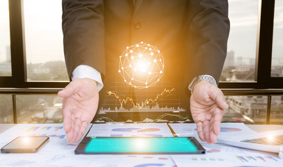 Businessman using concept tablet data graph analysis With modern technology