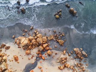 Aerial view. Beautiful seascape with rocks scattered across the coastal area.