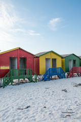 Naklejka premium colorful Beach Huts in Muizenberg on the beach