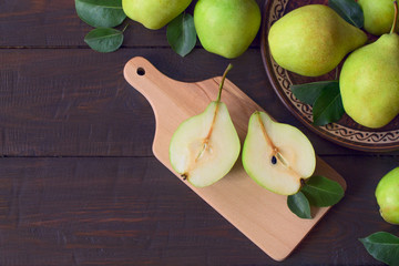 fresh ripe pears. pears top view. pear halves on the table. copy space. flat lay.