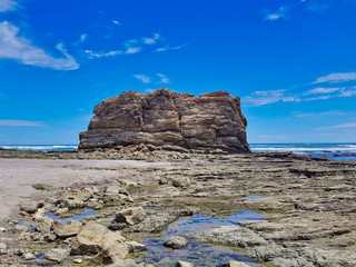 Lush Tropical Beach Paradise with blue water, great waves and rock formations in Malpais / Santa Teresa, Nicoya Peninsula Costa Rica