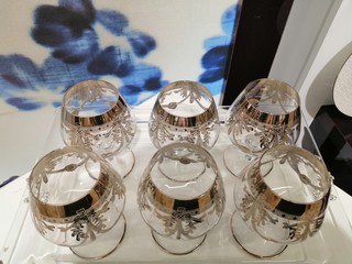 six beautiful glasses with silver patterns