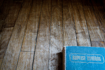 Hymnal on a wooden background 