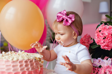 little girl with birthday cake