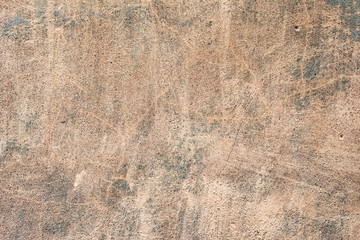 Texture of a concrete wall with cracks and scratches which can be used as a background