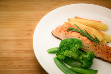 Homemade Grilled Salmon Steak and Vegetables Toping with Salmon Crispy Skin