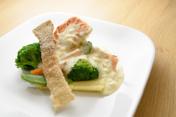 Homemade Grilled Salmon Steak and Vegetables Toping with Salmon Crispy Skin