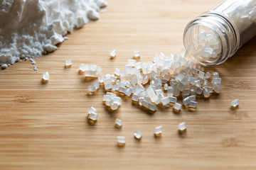 Biodegradable plastic pellets made from starch - obrazy, fototapety, plakaty