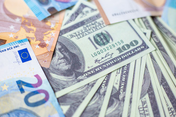 Obraz na płótnie Canvas Euro money with us dollar bill compettition background
