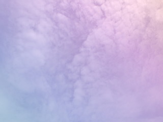 Sky and cloud subtle background with a pastel purple gradient. 