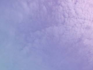 Sky and cloud subtle background with a pastel purple gradient. 