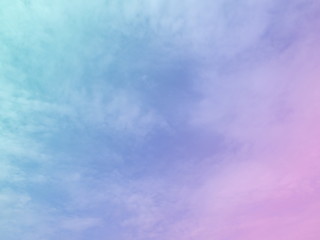 Sky and cloud subtle background with a blue  and purple pastel gradient. 