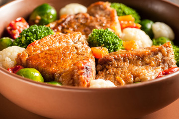 Meat stew with vegetables in a thick sauce.