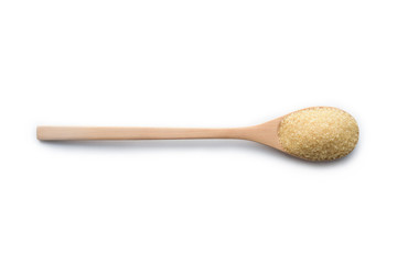 Brown sugar background with wooden spoon