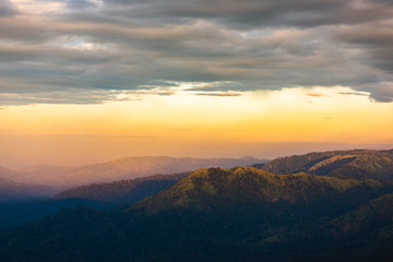 Silhouette of Mountain With Fluffy Clouds during Sunrise at Noen Chang Suek, Kanchanaburi, Thailand