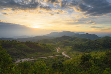Silhouette of Mountain With Fluffy Clouds during Sunrise at Noen Chang Suek, Kanchanaburi, Thailand