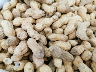 The fruits of peanuts in the shell, husk. Close-up
