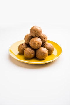 Churma Ladoo / atta laddoo / wheat flour laddu made using ghee and jaggery or sugar. selective focus