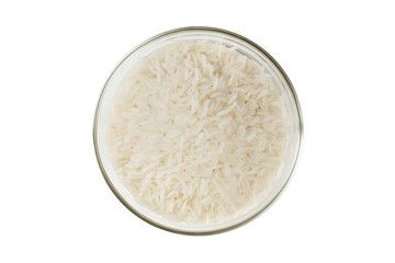 Fototapeta na wymiar Top view close up of Thai jasmine rice uncook in glass bowl, a long-grain variety of fragrant rice, white background isolate, clipping path