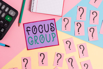 Handwriting text Focus Group. Conceptual photo showing assembled to participate in discussion about something Mathematics stuff and writing equipment above pastel colours background