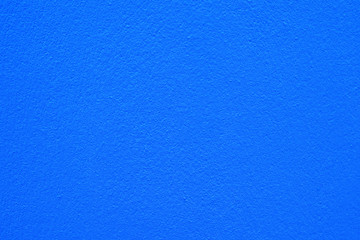 Blue cement or concrete wall texture for backgrounds. Empty space.