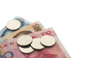 close up Chinese Yuan banknotes and coin background isolate with clipping path