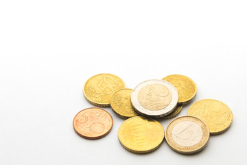 close up euro coins and coin background isolate