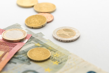close up euro coins and coin background isolate