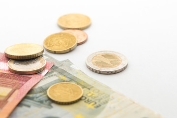 close up euro coins and coin background isolate