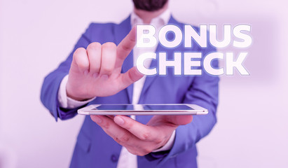 Word writing text Bonus Check. Business photo showcasing something in addition to what is expected or strictly due Businessman with pointing finger in front of him