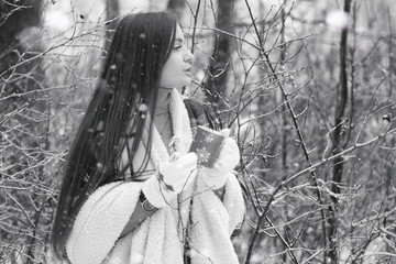 A girl in a winter cloudy day