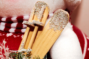 Christmas wooden ski toy with ice and snow. Nice backgrpound and holidays card